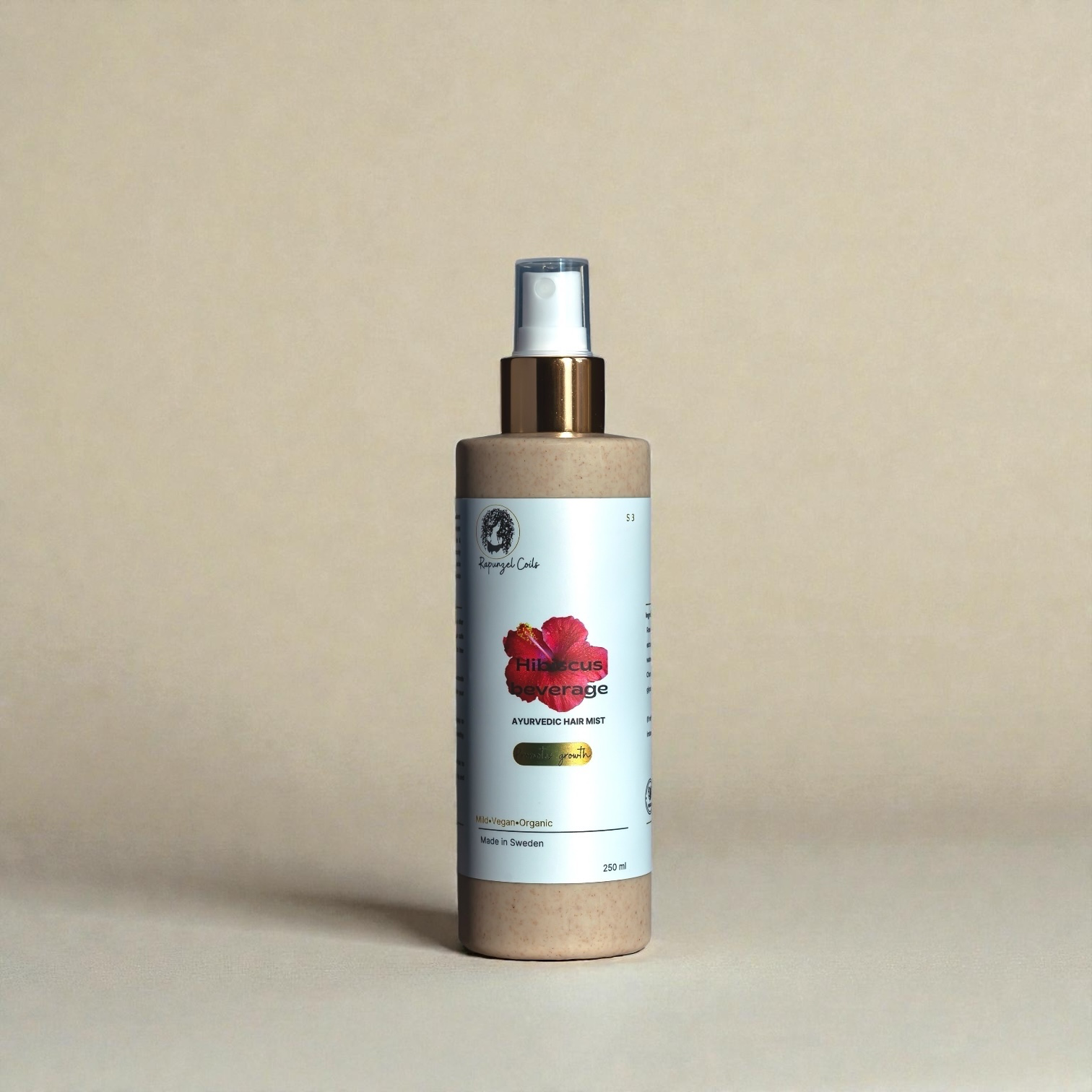 Hibiscus Beverage by Rapunzel Coils, an ayurvedic hair mist formulated to hydrate hair and support scalp health.