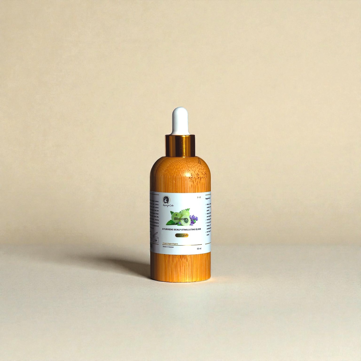 Bloom Hair Growth Stimulating oil by Rapunzel Coils, formulated to stimulate the scalp and support healthy hair growth.